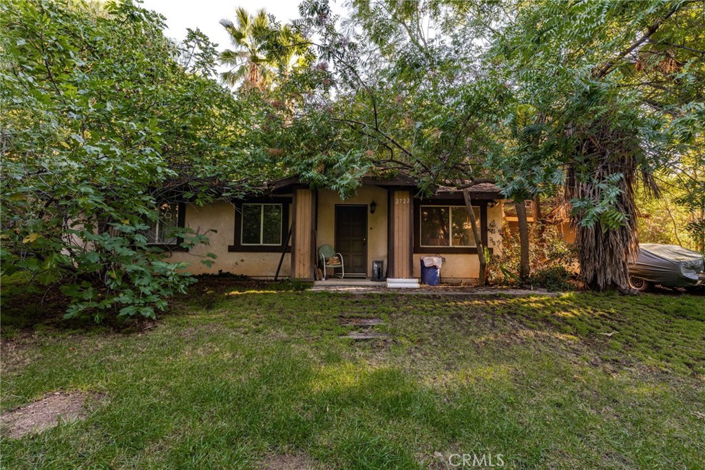 2700 Mill Creek Road Mentone, CA 92359 - Photo 18 of 22 front view of a house with a yard
