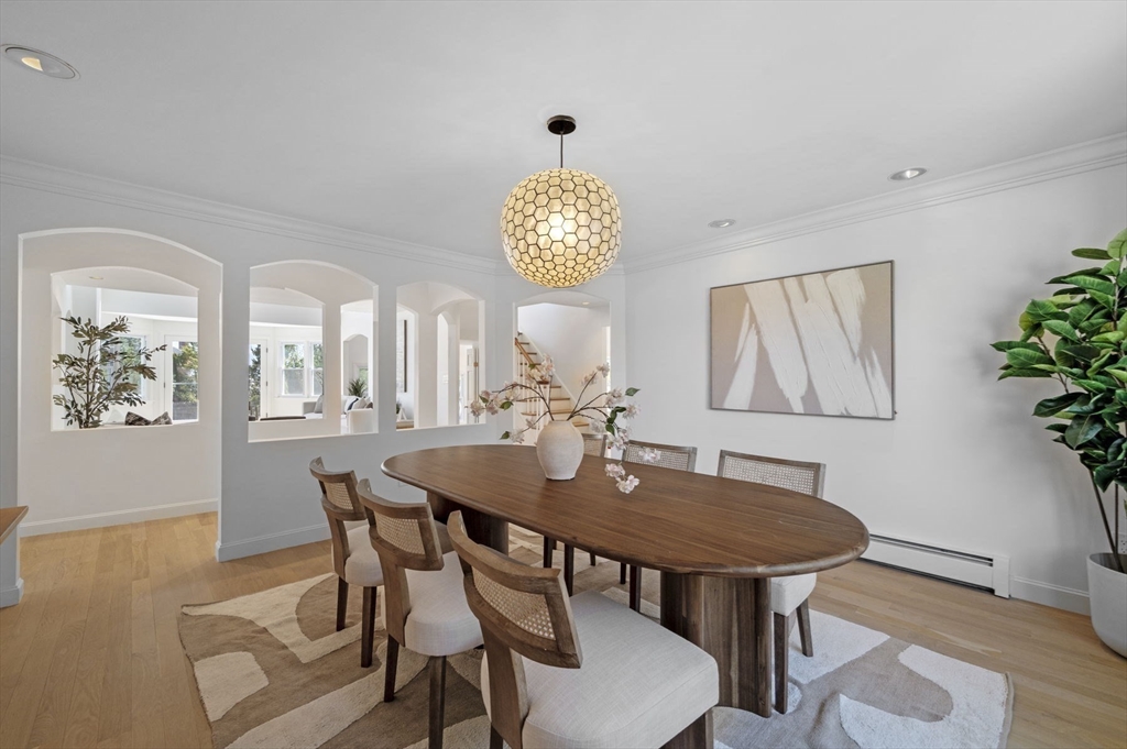 10 Rolleston Road Marblehead, MA 01945 - Photo 11 of 42 a view of a dining room with furniture and wooden floor