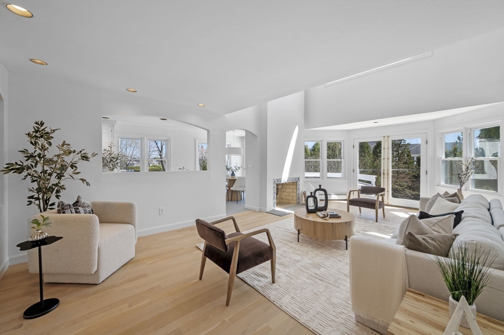 10 Rolleston Road Marblehead, MA 01945 - Photo 12 of 42 a living room with furniture and a potted plant
