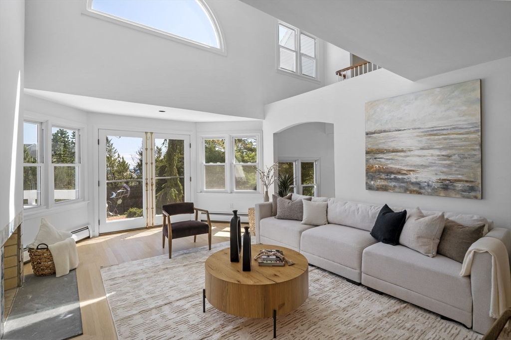 10 Rolleston Road Marblehead, MA 01945 - Photo 13 of 42 a living room with furniture a table and a large window