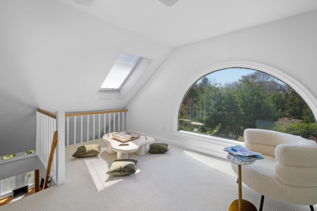 10 Rolleston Road Marblehead, MA 01945 - Photo 27 of 42 a living room with furniture and a large window