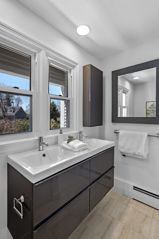 10 Rolleston Road Marblehead, MA 01945 - Photo 29 of 42 a bathroom with a sink and a mirror