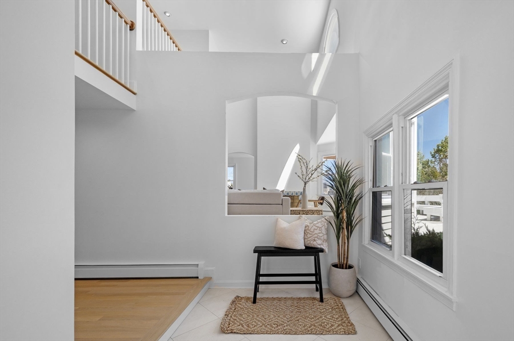 10 Rolleston Road Marblehead, MA 01945 - Photo 6 of 42 a view of entryway and hall with wooden floor