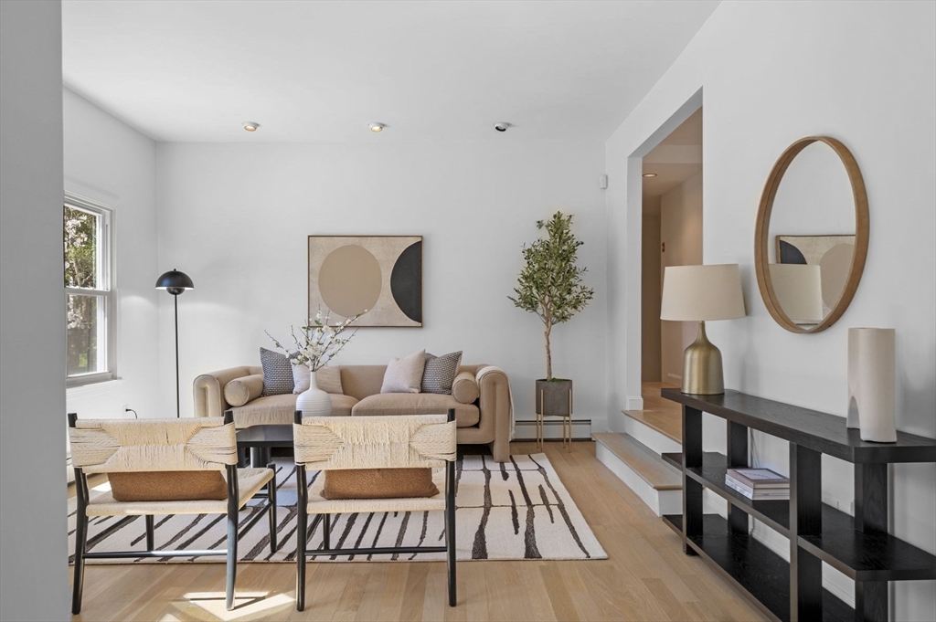 10 Rolleston Road Marblehead, MA 01945 - Photo 7 of 42 a living room with furniture a rug a potted plant and a wooden floor