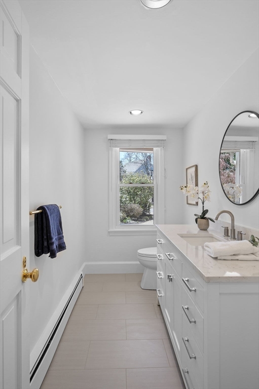 10 Rolleston Road Marblehead, MA 01945 - Photo 8 of 42 a bathroom with a granite countertop sink mirror vanity and toilet