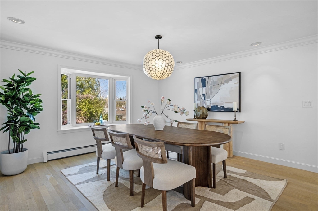 10 Rolleston Road Marblehead, MA 01945 - Photo 10 of 42 a view of a dining room with furniture window and wooden floor
