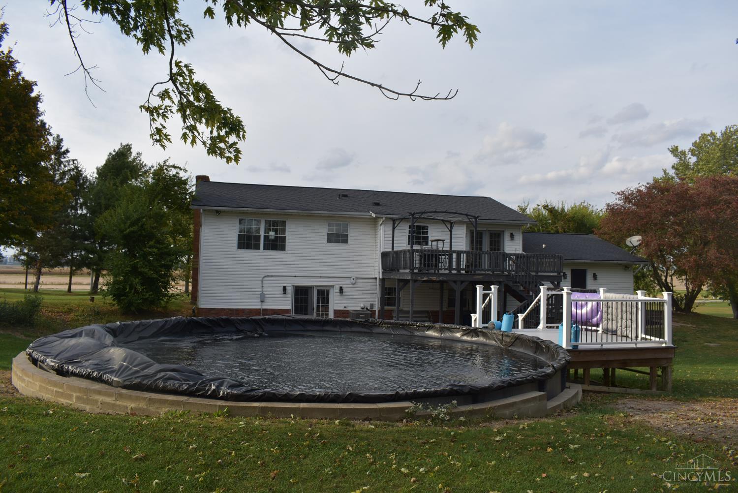 Looking from the edge of the private back yard to back of home.   No adjoining back neighbors