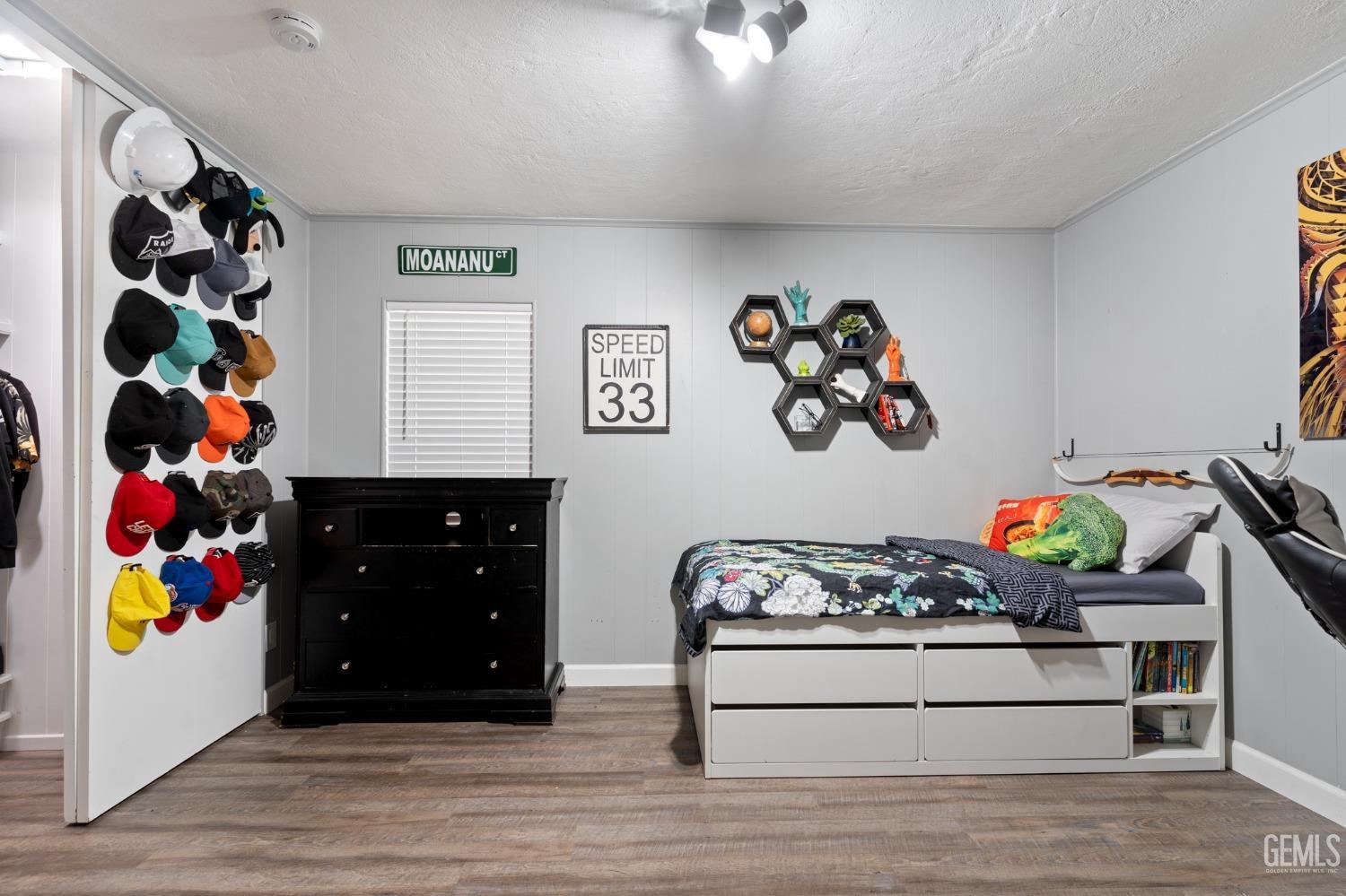 Undisclosed Address Bakersfield, CA 93306 - Photo 17 of 27 a room with a couch and a window