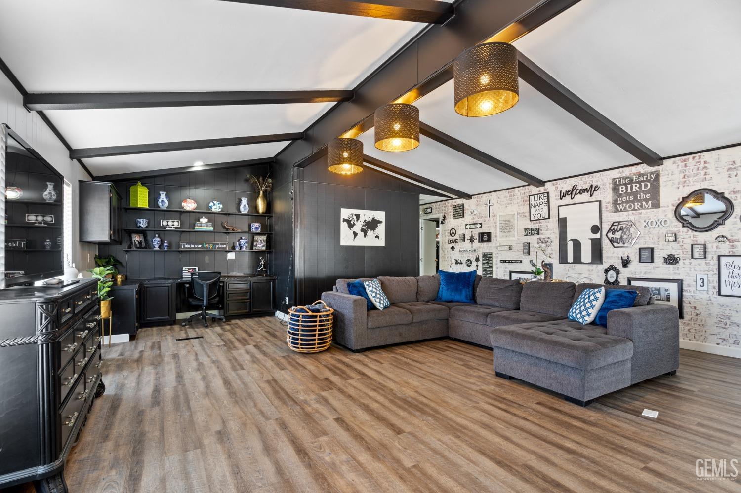 Undisclosed Address Bakersfield, CA 93306 - Photo 5 of 27 a living room with furniture and wooden floor