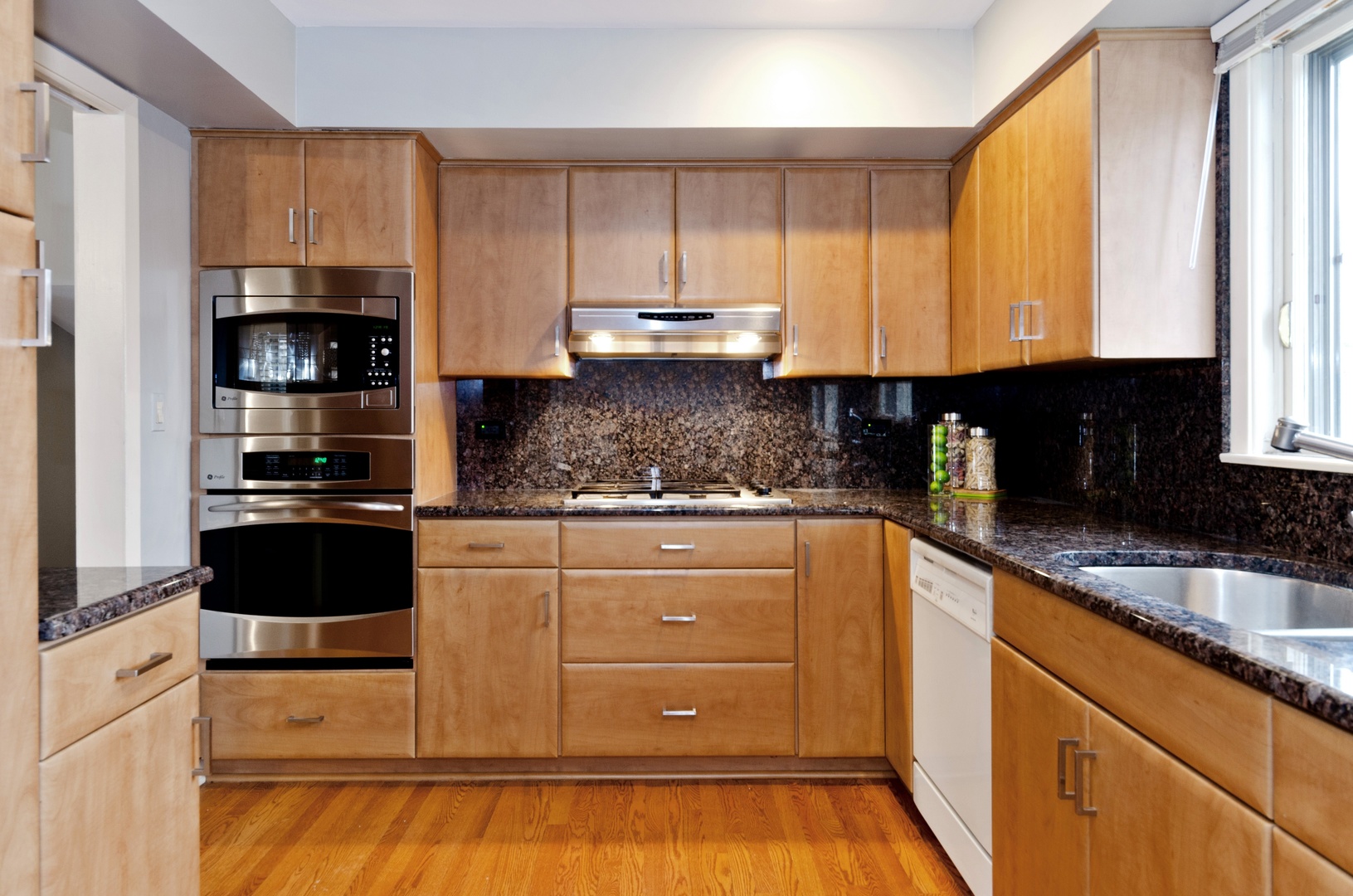 29 Ferndale Road Deerfield, IL 60015 - Photo 4 of 15 a kitchen with granite countertop a refrigerator sink and cabinets