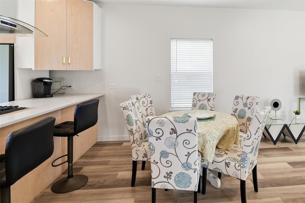521 York Street Athens, TX 75751 - Photo 13 of 34 a view of a dining room with furniture and wooden floor