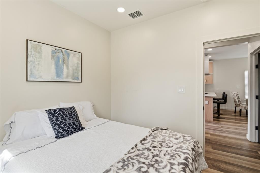 521 York Street Athens, TX 75751 - Photo 23 of 34 a bedroom with a bed and a view of bathroom
