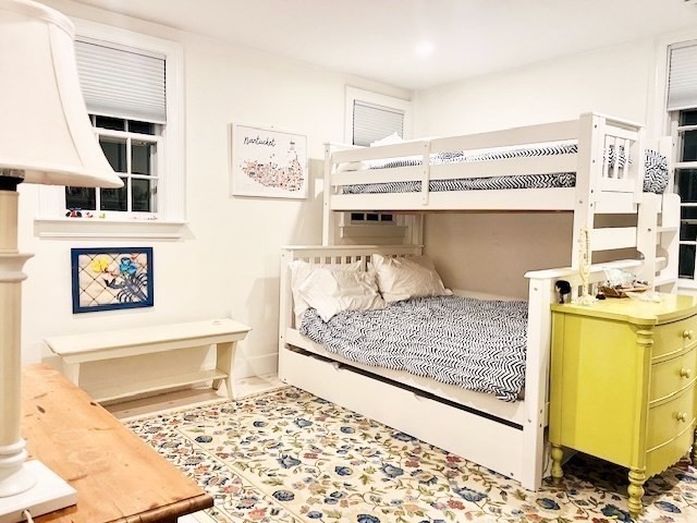 76 Orange Street Nantucket, MA 02554 - Photo 17 of 34 a living room with a couch and dresser