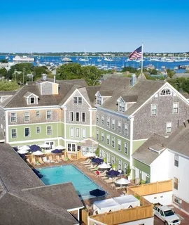 a view of swimming pool outdoor seating and city view
