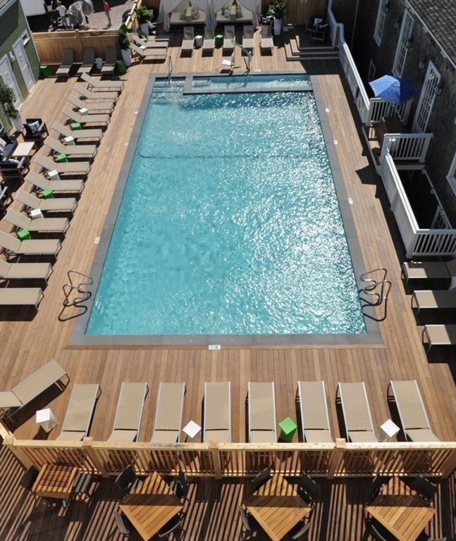 76 Orange Street Nantucket, MA 02554 - Photo 30 of 34 a view of swimming pool outdoor seating and city view
