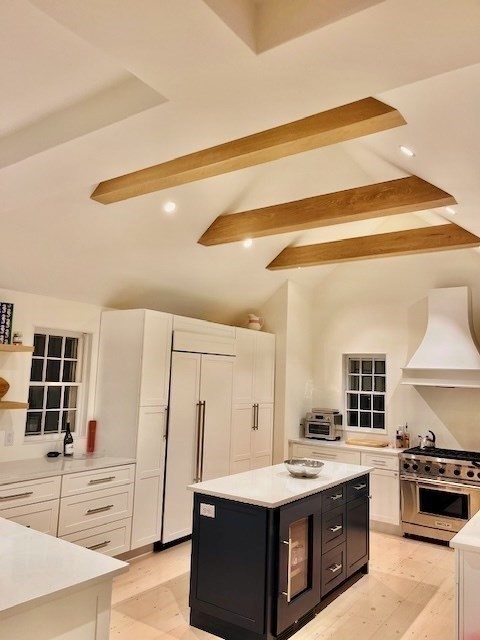 76 Orange Street Nantucket, MA 02554 - Photo 6 of 34 a kitchen with kitchen island sink stove and refrigerator