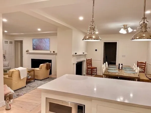 a room with furniture and a fireplace