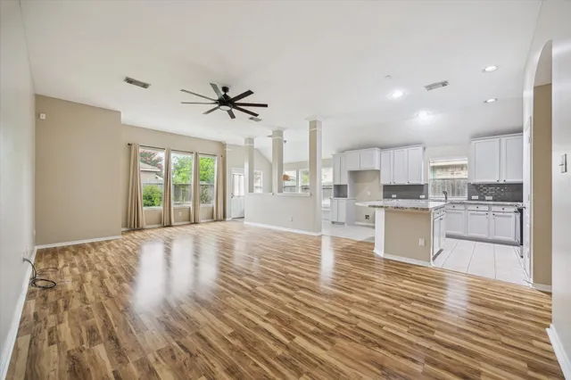 a view of kitchen with wooden floor and window