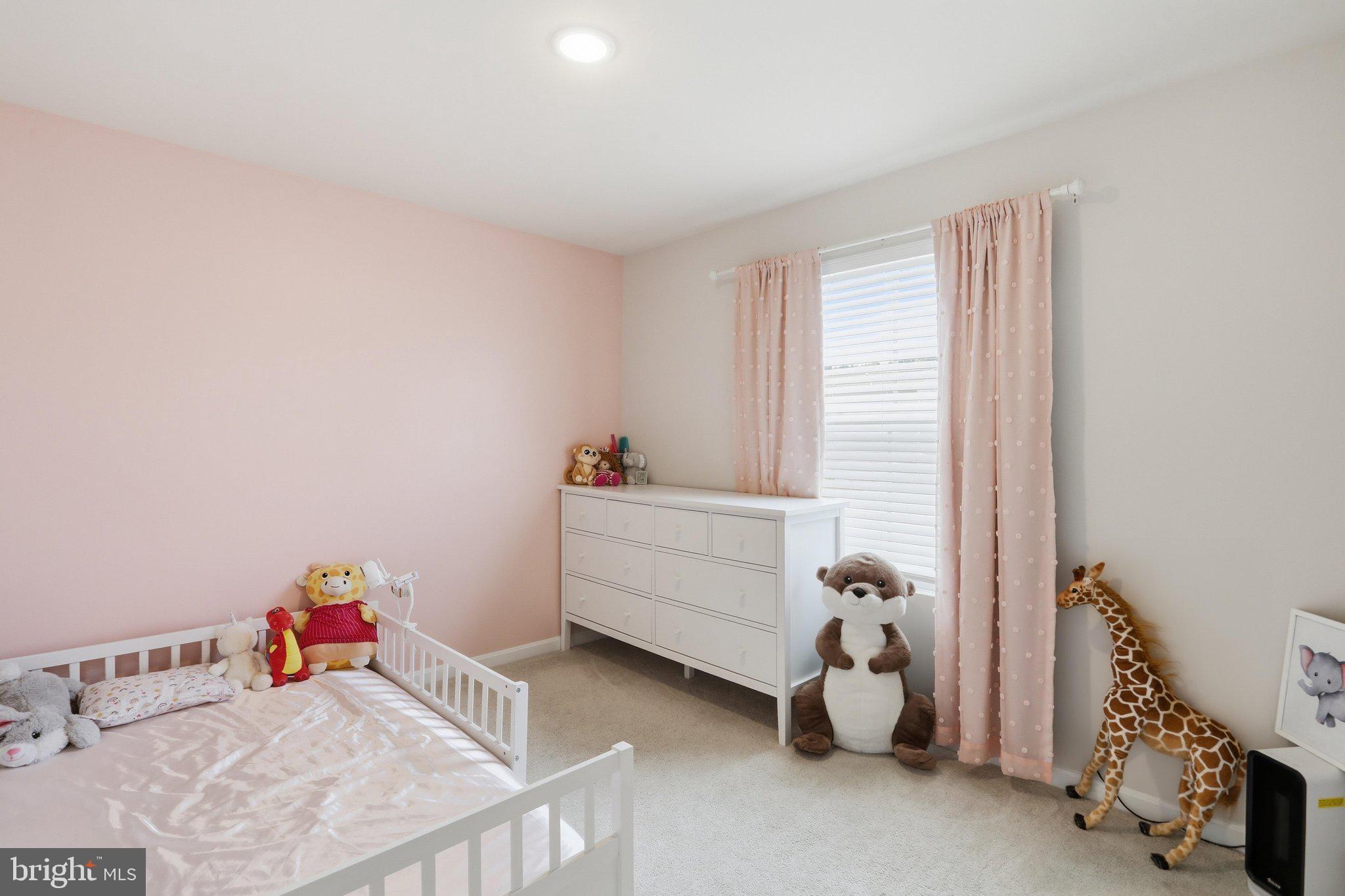 172 Rerdiz Road Hedgesville, WV 25427 - Photo 21 of 36 a room with toys and a window