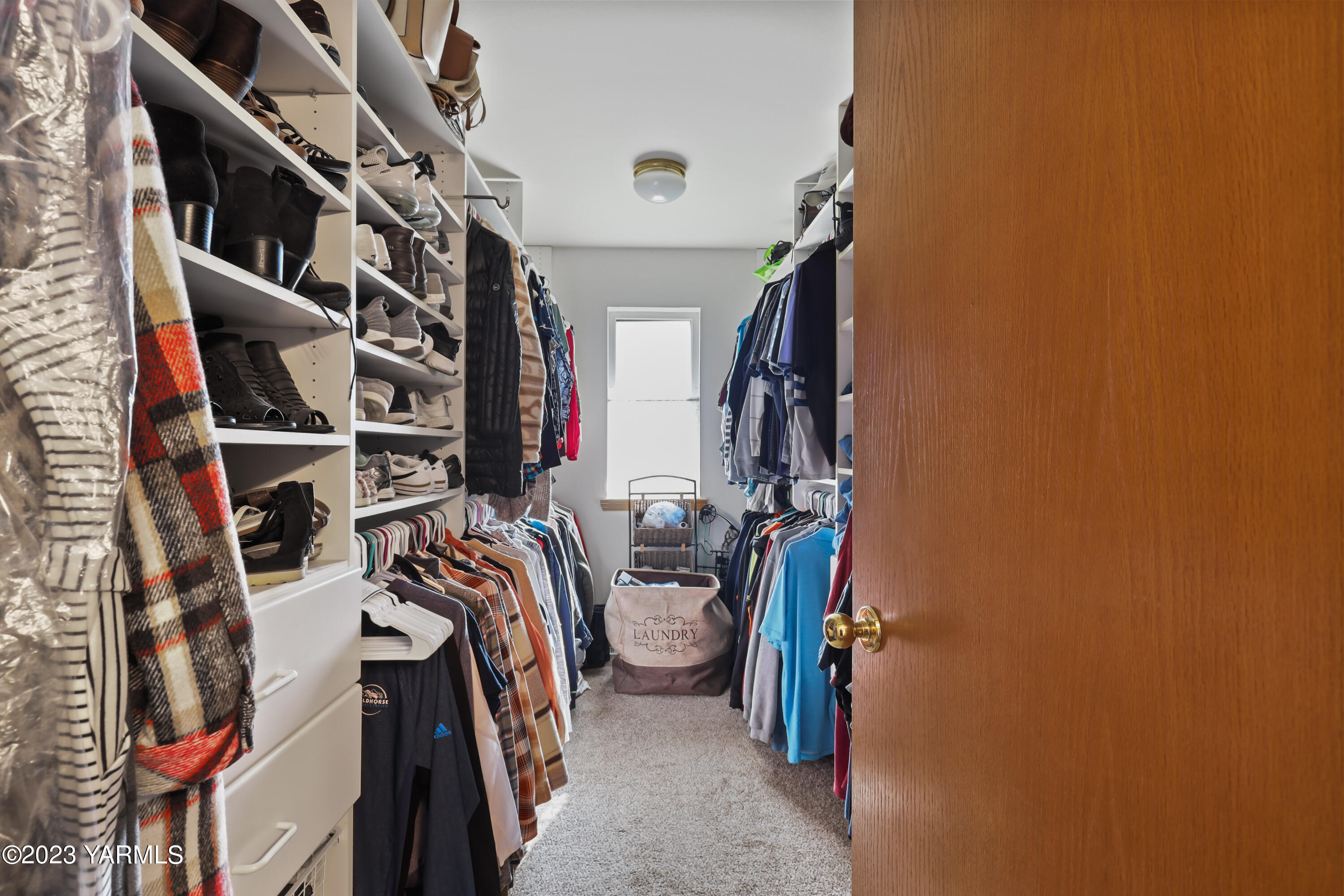 380 Wilson Road Yakima, WA 98901 - Photo 20 of 28 a view of walk in closet with clothes and shoes