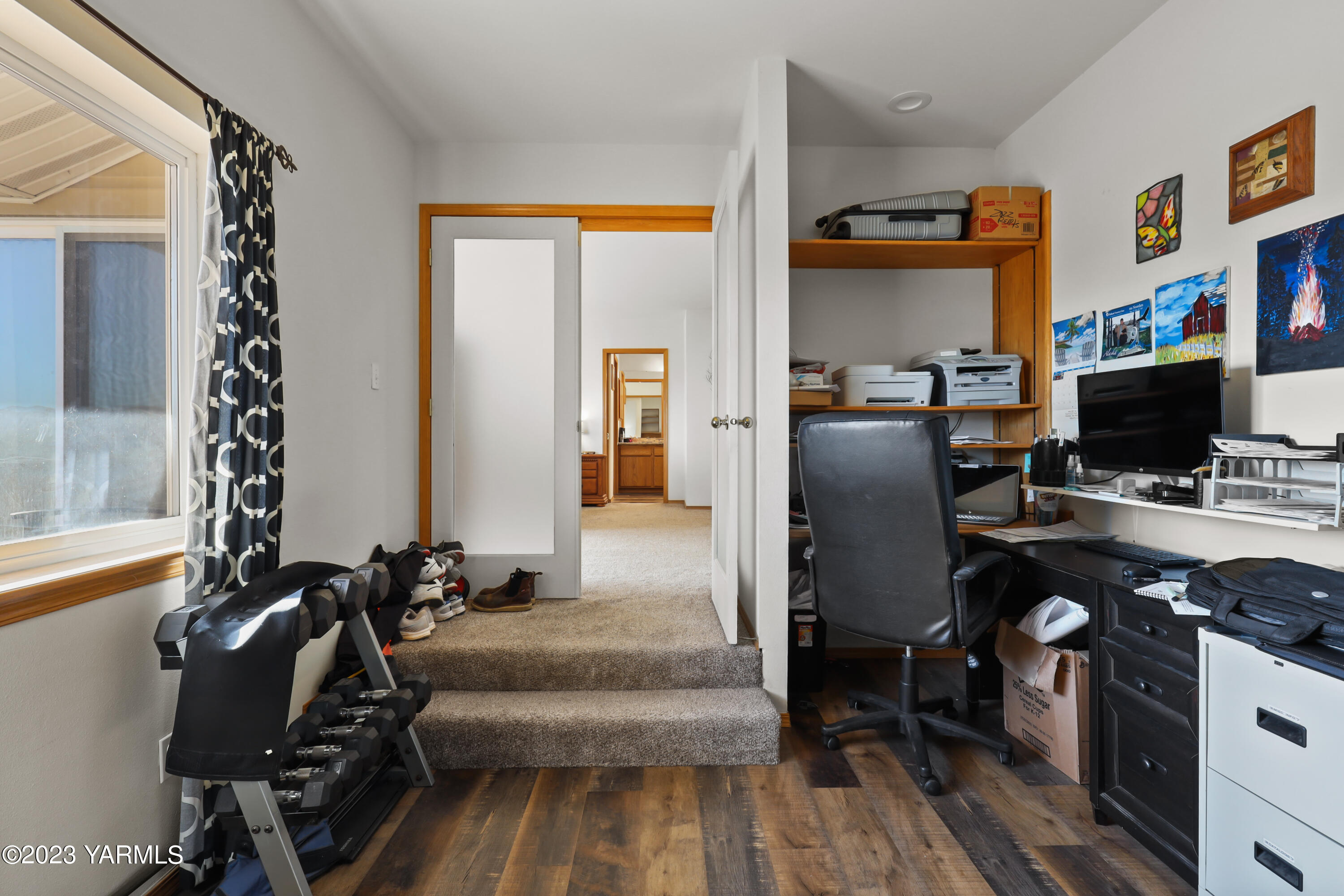 380 Wilson Road Yakima, WA 98901 - Photo 21 of 28 a view of a workspace with furniture and a window