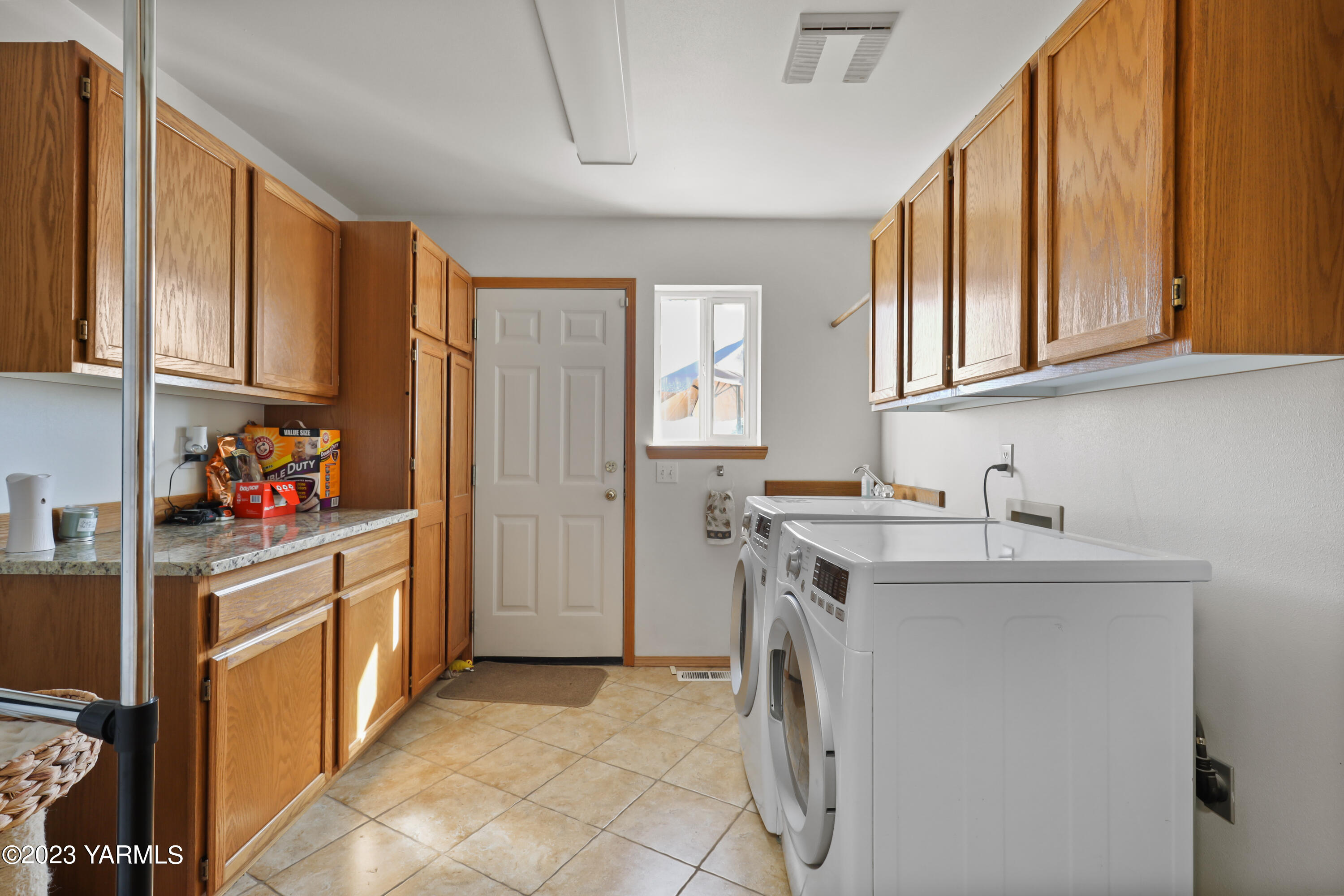380 Wilson Road Yakima, WA 98901 - Photo 22 of 28 a kitchen with a sink and cabinets