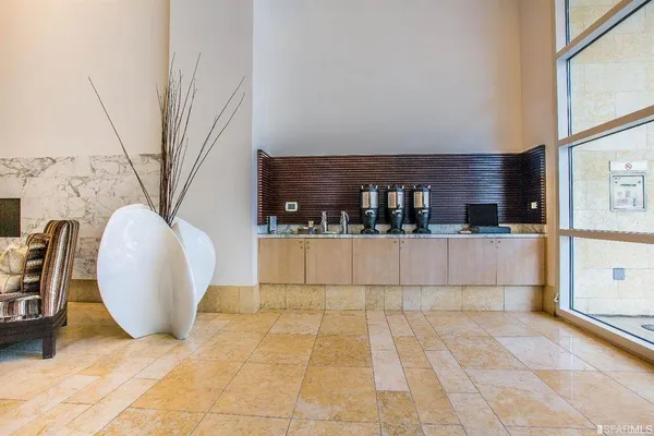 a view of a living room with furniture