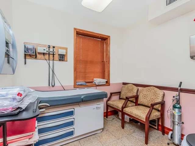 a room with furniture and window