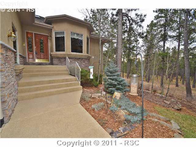 7270 Shoup Road Colorado Springs, CO 80908 - Photo 2 of 16 Welcoming covered entry.