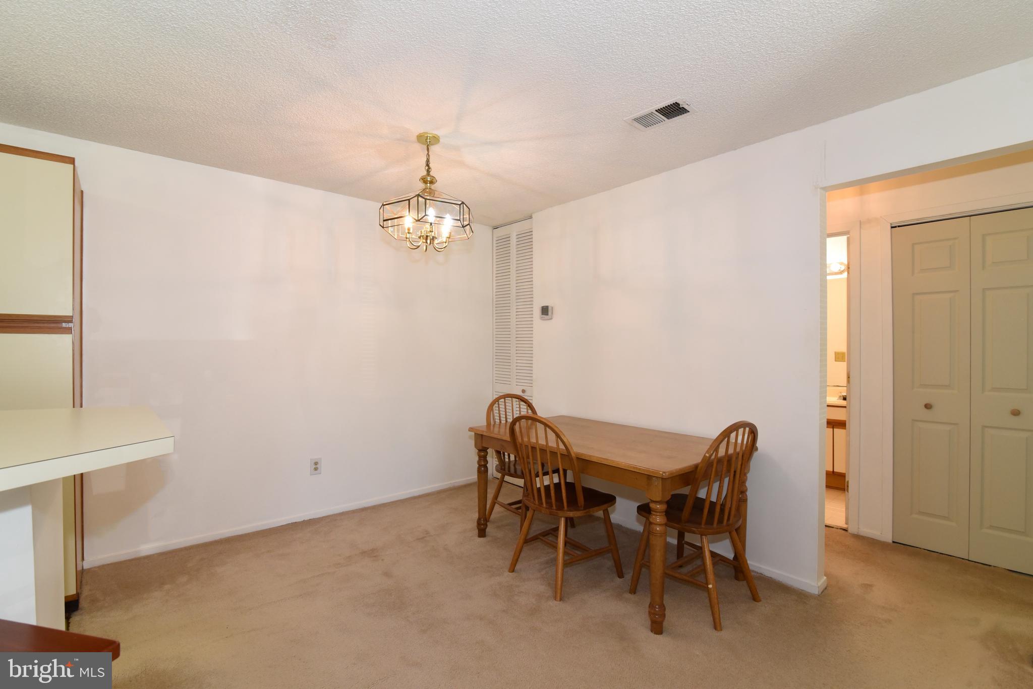 11705 Summerchase Circle, Unit 1705A Reston, VA 20194 - Photo 7 of 36 Dining room