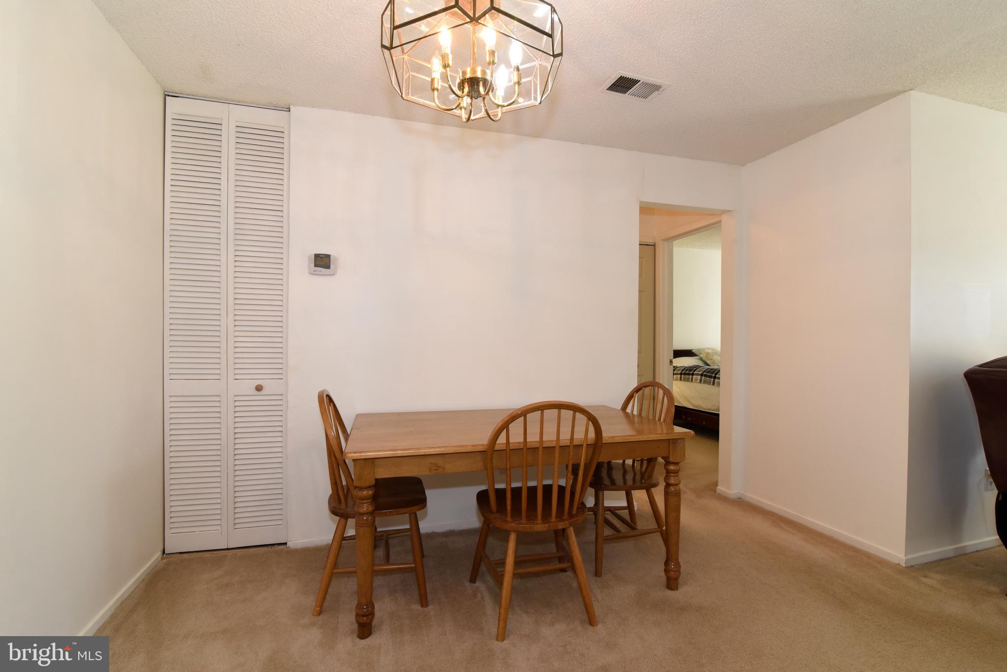 11705 Summerchase Circle, Unit 1705A Reston, VA 20194 - Photo 8 of 36 Dining room