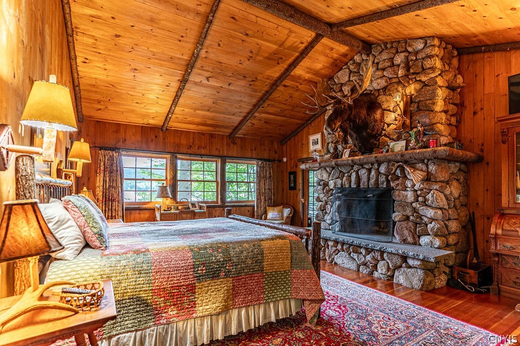 108 7th Lake Road Inlet, NY 13360 - Photo 32 of 49 1st Floor Primary Suite with Stone Fireplace