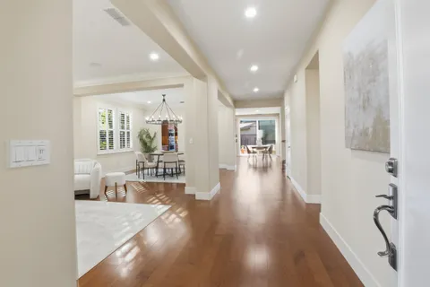 a view of a living room and dining room