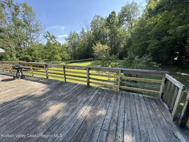 a view of a storage room with shoes and chairs