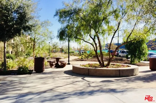 a view of a swimming pool with a lounge chair