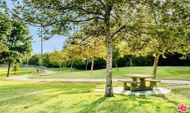a view of a park with a slide