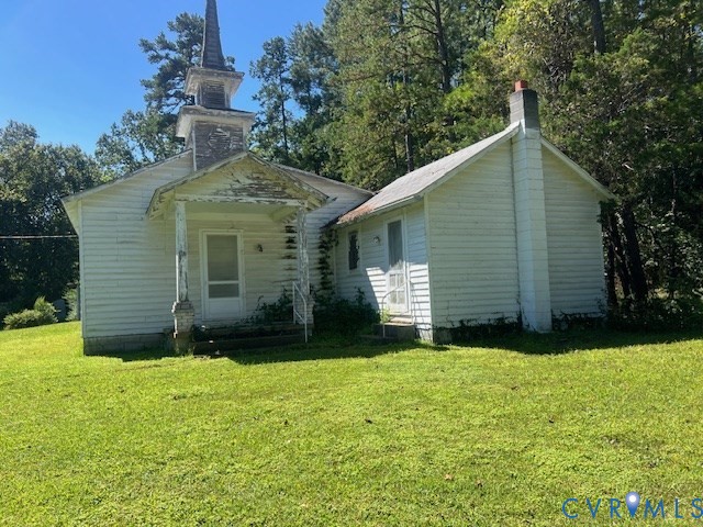 346-278 Trinity Road Keysville, VA 23947 - Photo 11 of 30 a view of a house with yard and a garden