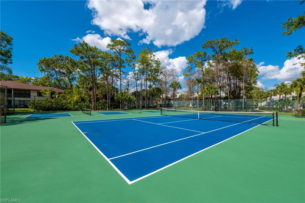 1915 Courtyard Way, Unit G202 Naples, FL 34112 - Photo 22 of 22 View of tennis court