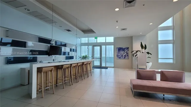 a view of a bathroom from a hallway