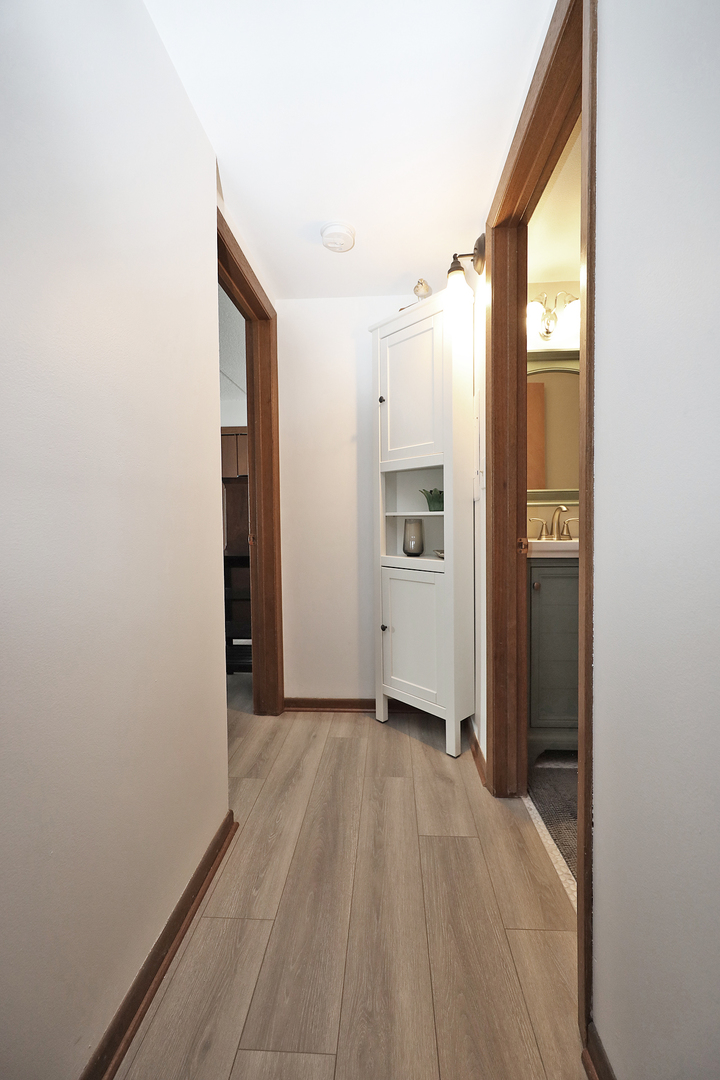 4946 Douglas Road, Unit 202 Downers Grove, IL 60515 - Photo 15 of 19 a view of an empty room with a window