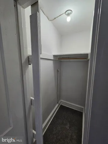 a empty room with wooden floor