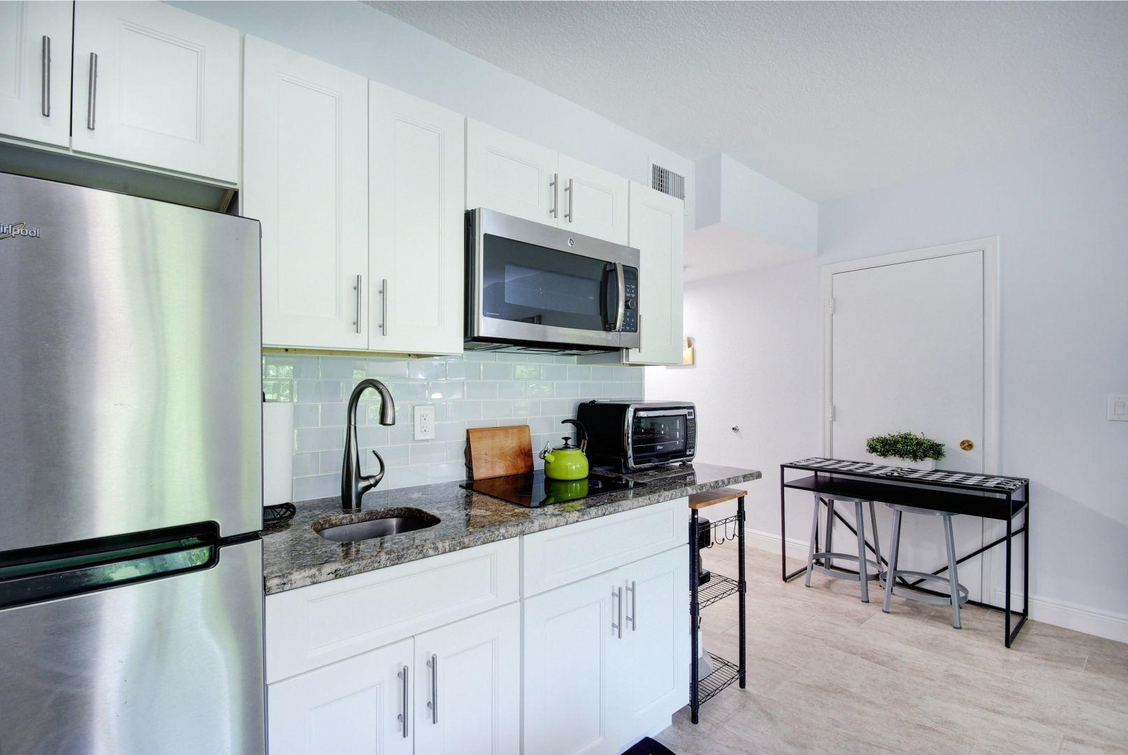 13334 Polo Club Road, Unit 247 Wellington, FL 33414 - Photo 6 of 15 Efficiency Kitchen