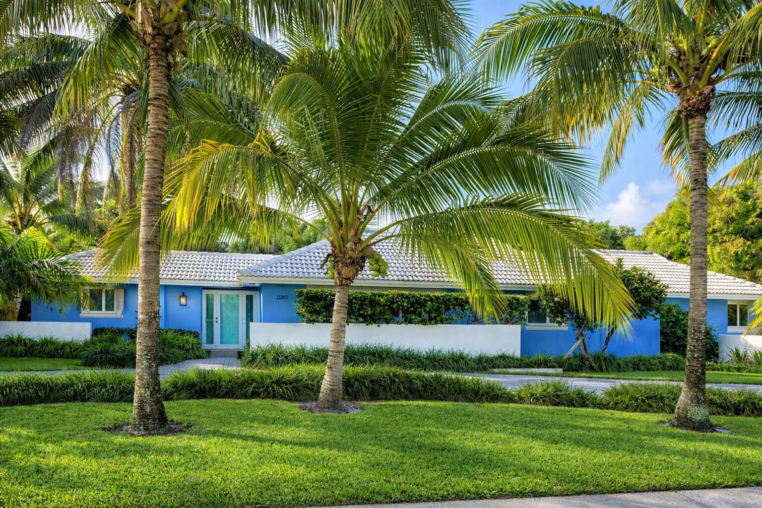 1120 Southwest 15th Street Boca Raton, FL 33486 - Photo 2 of 32 a view of a house with a yard