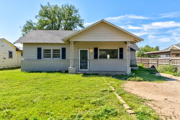a view of a house with garden