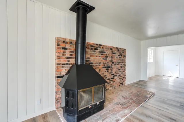 a living room with a rug