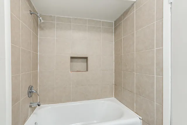 a bathroom with a bathtub