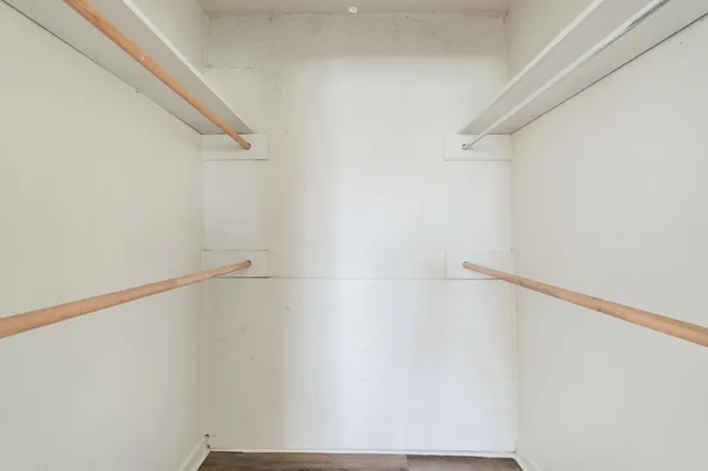 a view of small space with racks on the wall