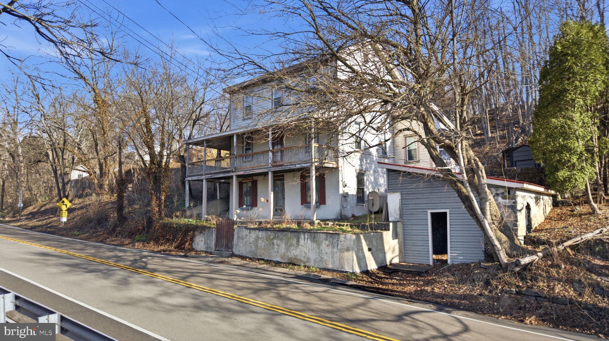 103 Gravel Pike Green Lane, PA 18054 - Photo 1 of 43 a view of a house with a yard