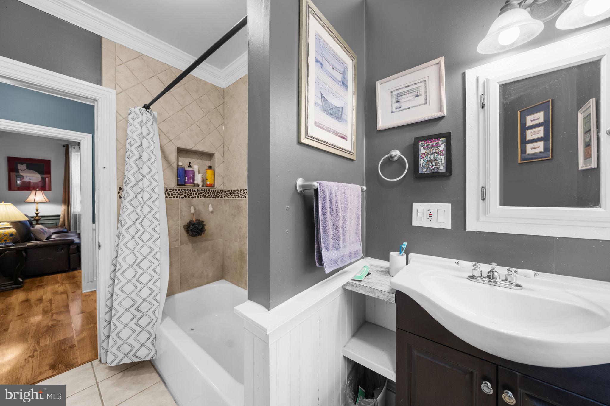 103 Gravel Pike Green Lane, PA 18054 - Photo 16 of 43 a bathroom with a sink and a mirror