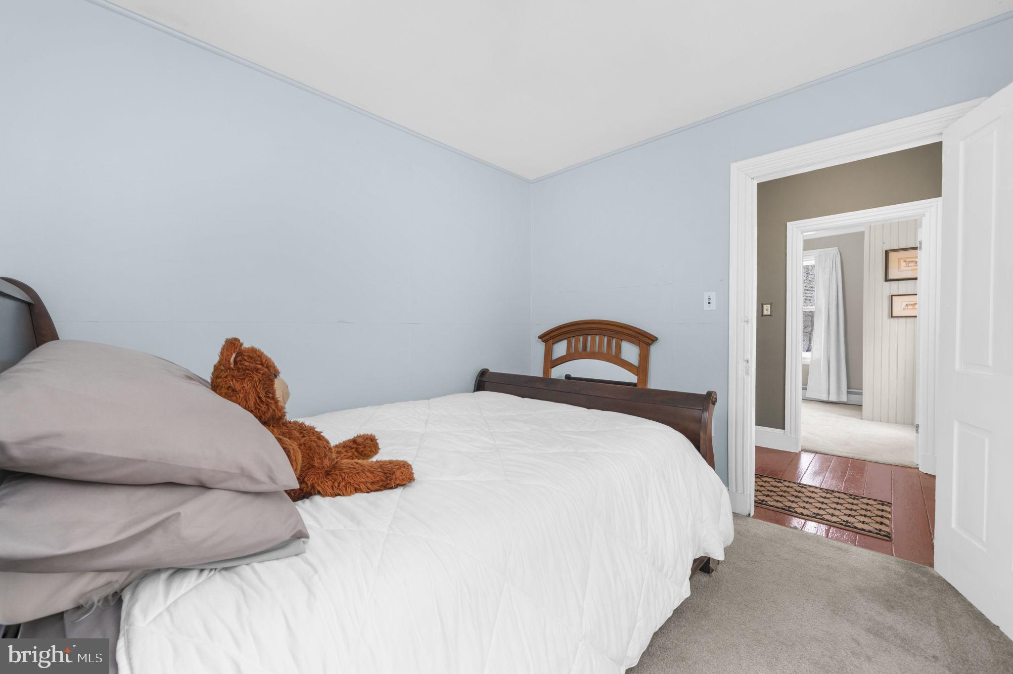 103 Gravel Pike Green Lane, PA 18054 - Photo 18 of 43 a bedroom with a bed and a window